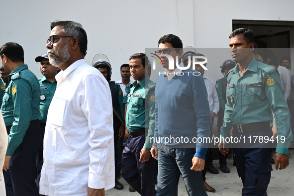 Police personnel escort detainee former ministers and leaders of the Bangladesh Awami League party to the country's International Crimes Tri...