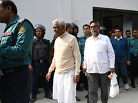 Police personnel escort detainee former ministers and leaders of the Bangladesh Awami League party to the country's International Crimes Tri...