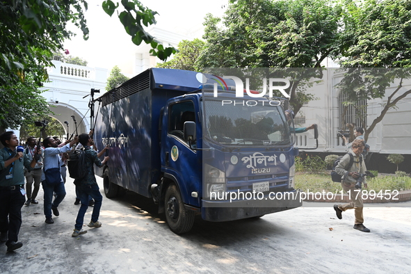 Prison vans transport former ministers and leaders of the Bangladesh Awami League party to jail after their court hearing from the Banglades...