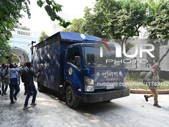 Prison vans transport former ministers and leaders of the Bangladesh Awami League party to jail after their court hearing from the Banglades...