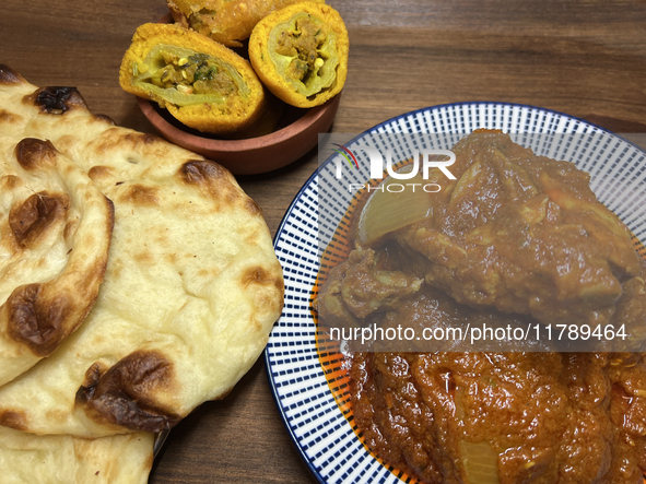 Chicken Karahi is served with naan and hot chili pakoras in Toronto, Ontario, Canada, on November 17, 2024. Chicken Karahi, or Kadai Chicken...