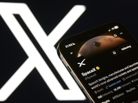 An editorial image shows an iPhone screen displaying Space X's account on the X social network platform. (