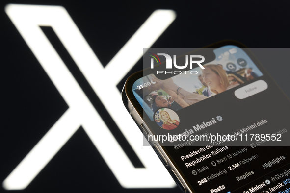 An editorial image shows an iPhone screen displaying Giorgia Meloni's personal account on the X social network platform. 