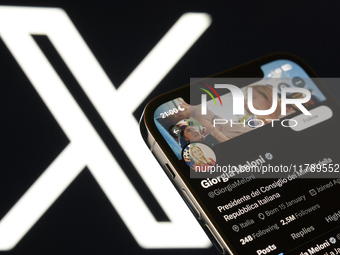 An editorial image shows an iPhone screen displaying Giorgia Meloni's personal account on the X social network platform. (