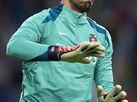 Diogo Costa of Portugal reacts during the warm-up prior to the UEFA Nations League 2024/25 League A Group A1 match between Portugal and Pola...