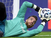 Jose Sa of Portugal warms up before the UEFA Nations League 2024/25 League A Group A1 match between Portugal and Poland at Estadio Do Dragao...