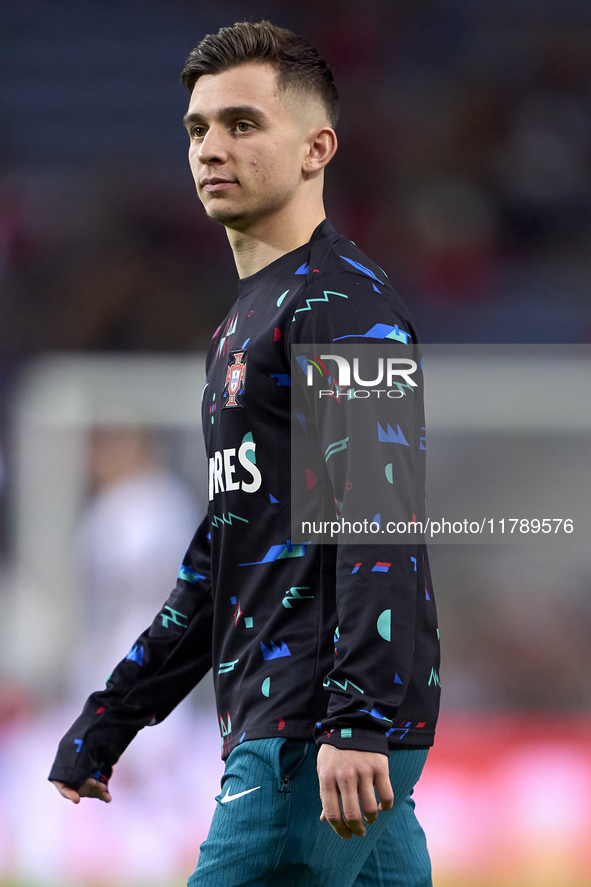 Francisco Conceicao of Portugal looks on during the warm-up prior to the UEFA Nations League 2024/25 League A Group A1 match between Portuga...