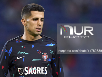 Joao Cancelo of Portugal looks on during the warm-up prior to the UEFA Nations League 2024/25 League A Group A1 match between Portugal and P...