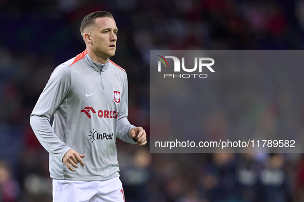 Piotr Zielinski of Poland looks on during the warm-up prior to the UEFA Nations League 2024/25 League A Group A1 match between Portugal and...