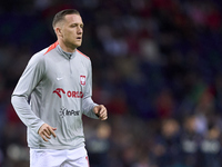 Piotr Zielinski of Poland looks on during the warm-up prior to the UEFA Nations League 2024/25 League A Group A1 match between Portugal and...