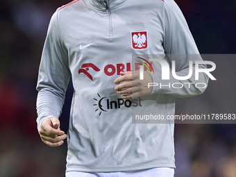 Piotr Zielinski of Poland looks on during the warm-up prior to the UEFA Nations League 2024/25 League A Group A1 match between Portugal and...