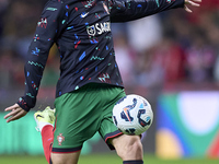 Joao Neves of Portugal warms up before the UEFA Nations League 2024/25 League A Group A1 match between Portugal and Poland at Estadio Do Dra...