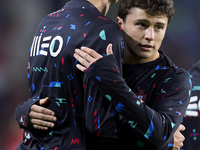 Joao Neves hugs Antonio Silva of Portugal during the warm-up prior to the UEFA Nations League 2024/25 League A Group A1 match between Portug...