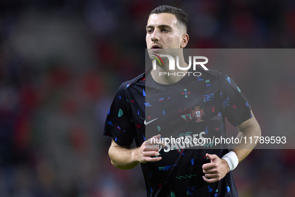 Diogo Dalot of Portugal warms up before the UEFA Nations League 2024/25 League A Group A1 match between Portugal and Poland at Estadio Do Dr...