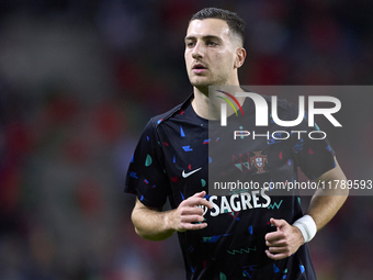 Diogo Dalot of Portugal warms up before the UEFA Nations League 2024/25 League A Group A1 match between Portugal and Poland at Estadio Do Dr...