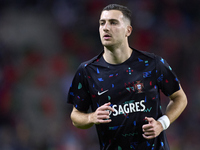 Diogo Dalot of Portugal warms up before the UEFA Nations League 2024/25 League A Group A1 match between Portugal and Poland at Estadio Do Dr...