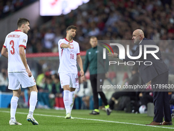 Michal Probierz, Head Coach of Poland, gives instructions to Taras Romanczuk of Poland during the UEFA Nations League 2024/25 League A Group...