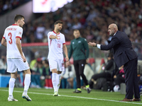 Michal Probierz, Head Coach of Poland, gives instructions to Taras Romanczuk of Poland during the UEFA Nations League 2024/25 League A Group...