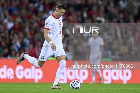 Jan Bednarek of Poland is in action during the UEFA Nations League 2024/25 League A Group A1 match between Portugal and Poland at Estadio Do...