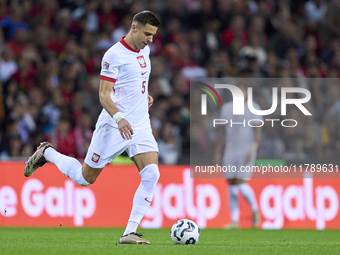 Jan Bednarek of Poland is in action during the UEFA Nations League 2024/25 League A Group A1 match between Portugal and Poland at Estadio Do...