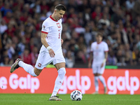 Jan Bednarek of Poland is in action during the UEFA Nations League 2024/25 League A Group A1 match between Portugal and Poland at Estadio Do...