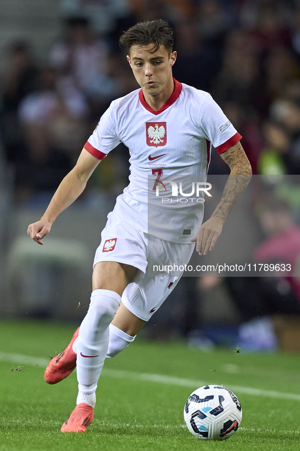 Kacper Urbanski of Poland plays during the UEFA Nations League 2024/25 League A Group A1 match between Portugal and Poland at Estadio Do Dra...