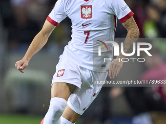 Kacper Urbanski of Poland plays during the UEFA Nations League 2024/25 League A Group A1 match between Portugal and Poland at Estadio Do Dra...