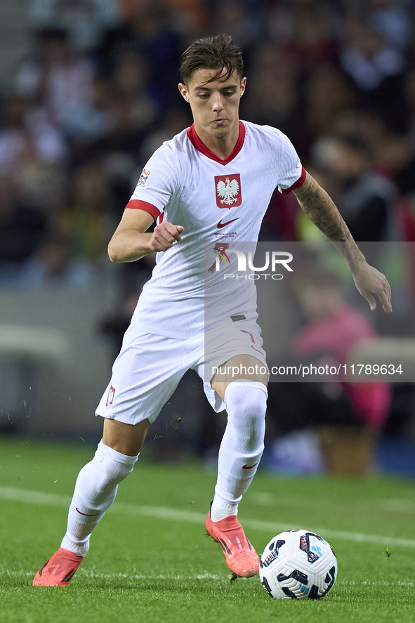 Kacper Urbanski of Poland plays during the UEFA Nations League 2024/25 League A Group A1 match between Portugal and Poland at Estadio Do Dra...