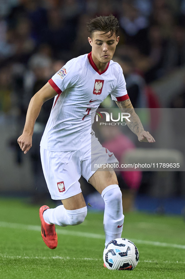 Kacper Urbanski of Poland plays during the UEFA Nations League 2024/25 League A Group A1 match between Portugal and Poland at Estadio Do Dra...