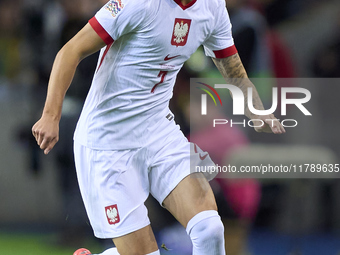 Kacper Urbanski of Poland plays during the UEFA Nations League 2024/25 League A Group A1 match between Portugal and Poland at Estadio Do Dra...