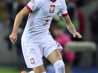 Kacper Urbanski of Poland plays during the UEFA Nations League 2024/25 League A Group A1 match between Portugal and Poland at Estadio Do Dra...