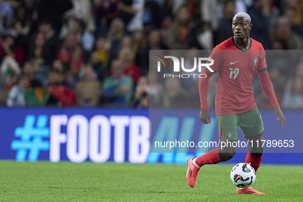 Nuno Mendes of Portugal is in action during the UEFA Nations League 2024/25 League A Group A1 match between Portugal and Poland at Estadio D...