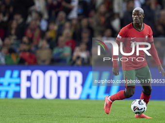 Nuno Mendes of Portugal is in action during the UEFA Nations League 2024/25 League A Group A1 match between Portugal and Poland at Estadio D...