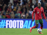 Nuno Mendes of Portugal is in action during the UEFA Nations League 2024/25 League A Group A1 match between Portugal and Poland at Estadio D...