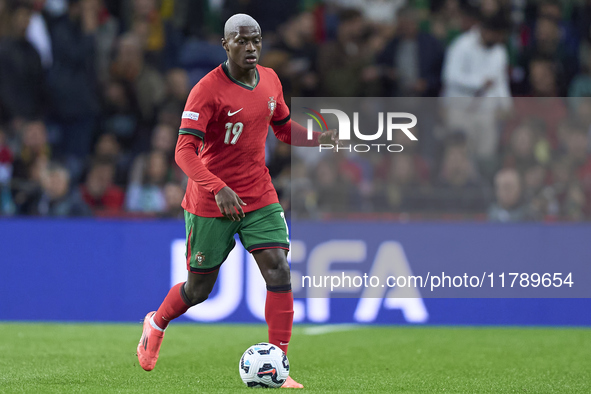 Nuno Mendes of Portugal is in action during the UEFA Nations League 2024/25 League A Group A1 match between Portugal and Poland at Estadio D...