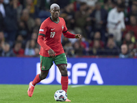 Nuno Mendes of Portugal is in action during the UEFA Nations League 2024/25 League A Group A1 match between Portugal and Poland at Estadio D...