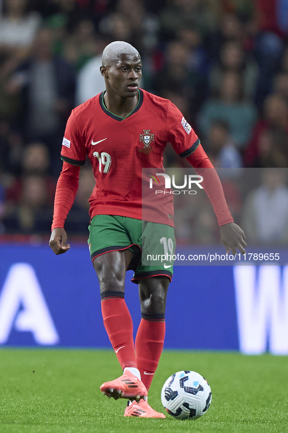 Nuno Mendes of Portugal is in action during the UEFA Nations League 2024/25 League A Group A1 match between Portugal and Poland at Estadio D...