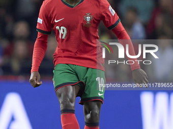 Nuno Mendes of Portugal is in action during the UEFA Nations League 2024/25 League A Group A1 match between Portugal and Poland at Estadio D...