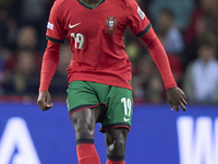 Nuno Mendes of Portugal is in action during the UEFA Nations League 2024/25 League A Group A1 match between Portugal and Poland at Estadio D...