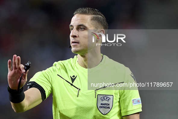 Referee Donatas Rumsas reacts during the UEFA Nations League 2024/25 League A Group A1 match between Portugal and Poland at Estadio Do Draga...