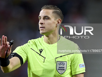 Referee Donatas Rumsas reacts during the UEFA Nations League 2024/25 League A Group A1 match between Portugal and Poland at Estadio Do Draga...