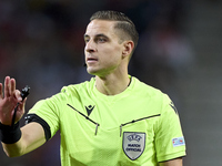 Referee Donatas Rumsas reacts during the UEFA Nations League 2024/25 League A Group A1 match between Portugal and Poland at Estadio Do Draga...