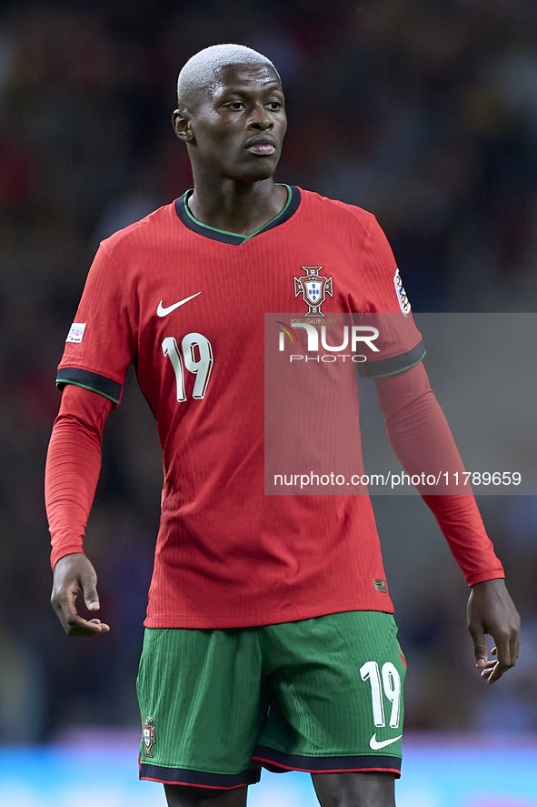 Nuno Mendes of Portugal looks on during the UEFA Nations League 2024/25 League A Group A1 match between Portugal and Poland at Estadio Do Dr...