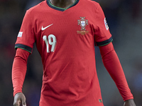 Nuno Mendes of Portugal looks on during the UEFA Nations League 2024/25 League A Group A1 match between Portugal and Poland at Estadio Do Dr...