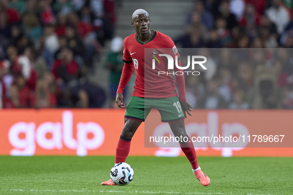 Nuno Mendes of Portugal is in action during the UEFA Nations League 2024/25 League A Group A1 match between Portugal and Poland at Estadio D...