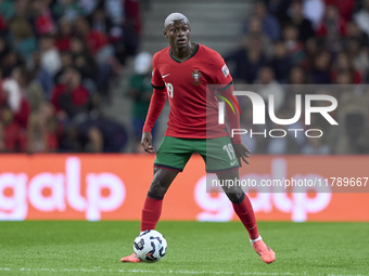 Nuno Mendes of Portugal is in action during the UEFA Nations League 2024/25 League A Group A1 match between Portugal and Poland at Estadio D...