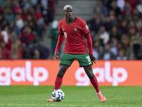 Nuno Mendes of Portugal is in action during the UEFA Nations League 2024/25 League A Group A1 match between Portugal and Poland at Estadio D...