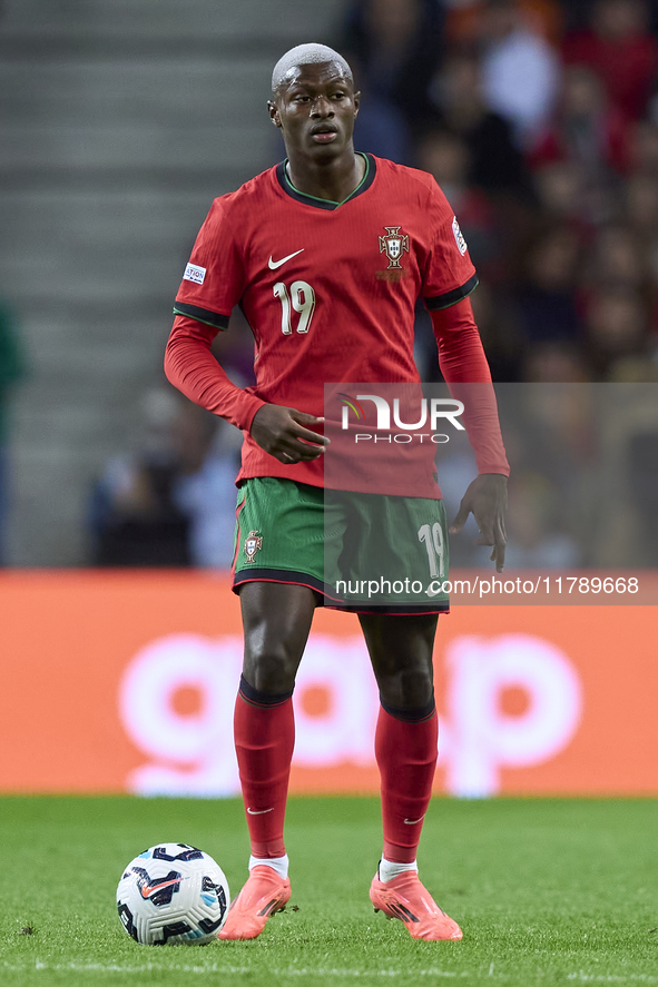 Nuno Mendes of Portugal is in action during the UEFA Nations League 2024/25 League A Group A1 match between Portugal and Poland at Estadio D...