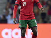 Nuno Mendes of Portugal is in action during the UEFA Nations League 2024/25 League A Group A1 match between Portugal and Poland at Estadio D...