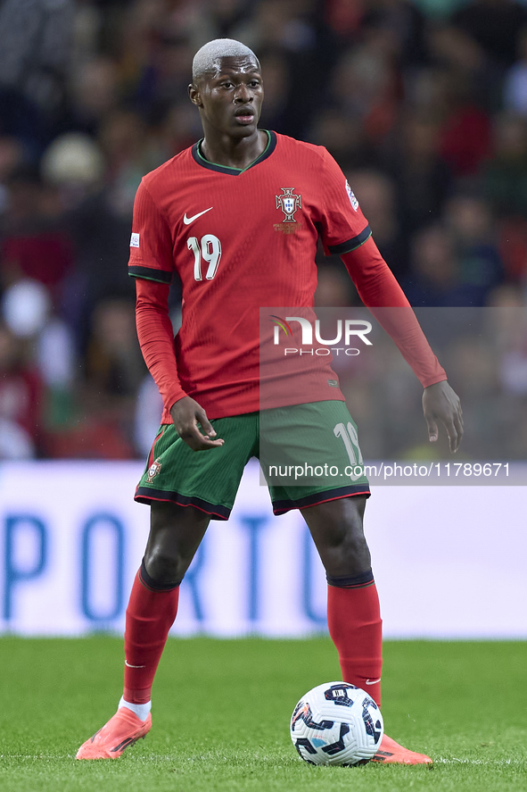 Nuno Mendes of Portugal is in action during the UEFA Nations League 2024/25 League A Group A1 match between Portugal and Poland at Estadio D...